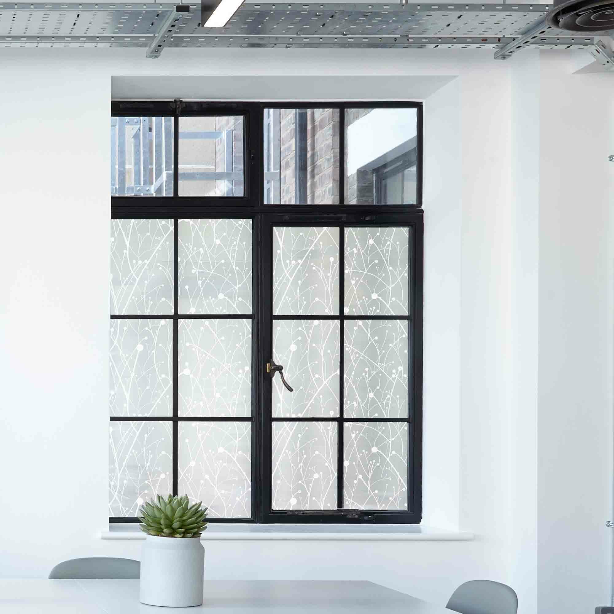 Willow in a breeze is the pattern adorning our favorite print for bathroom privacy window film, shown here in a conference room.