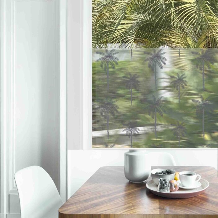 Dining table with fresh flowers and breakfast tray with coffee c Dining table with fresh flowers and breakfast tray with coffee c