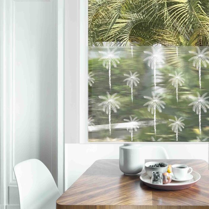 Dining table with fresh flowers and breakfast tray with coffee c Dining table with fresh flowers and breakfast tray with coffee c