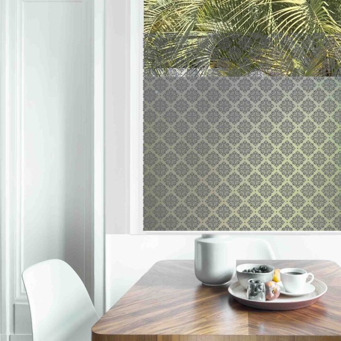 Dining table with fresh flowers and breakfast tray with coffee c Dining table with fresh flowers and breakfast tray with coffee c