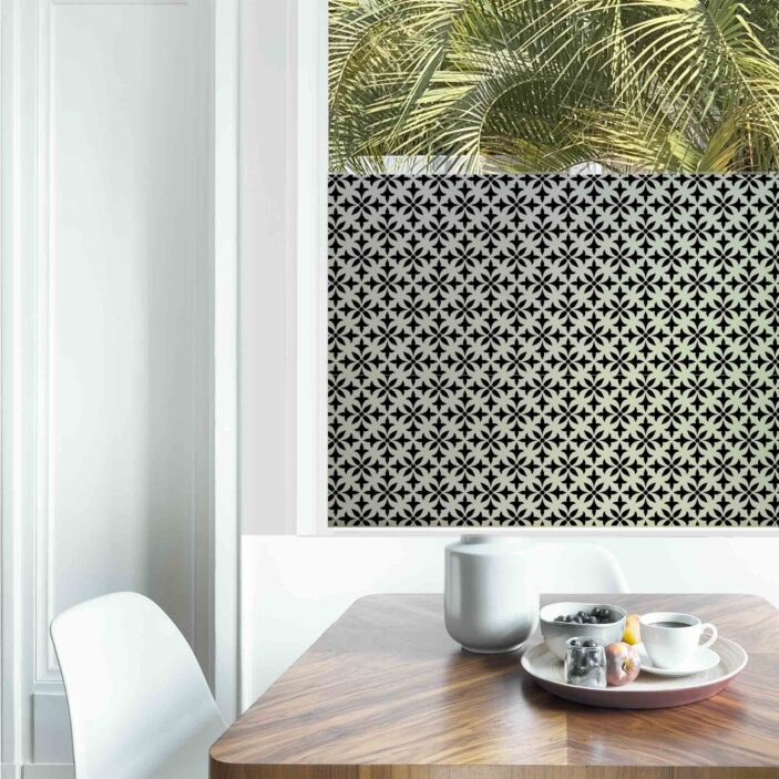 Dining table with fresh flowers and breakfast tray with coffee c Dining table with fresh flowers and breakfast tray with coffee c