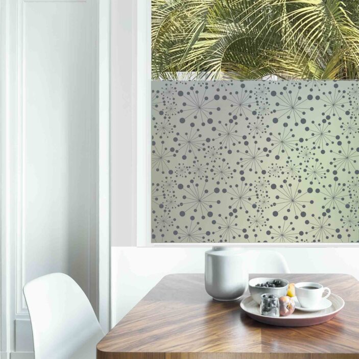 Dining table with fresh flowers and breakfast tray with coffee c Dining table with fresh flowers and breakfast tray with coffee c