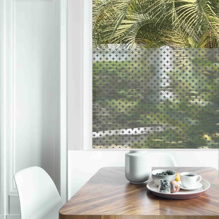 Dining table with fresh flowers and breakfast tray with coffee c Dining table with fresh flowers and breakfast tray with coffee c