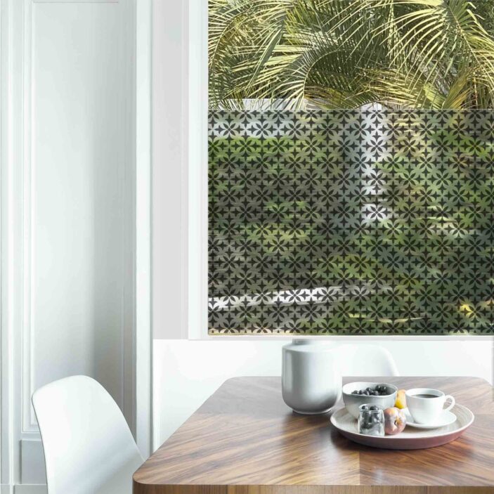 Dining table with fresh flowers and breakfast tray with coffee c Dining table with fresh flowers and breakfast tray with coffee c