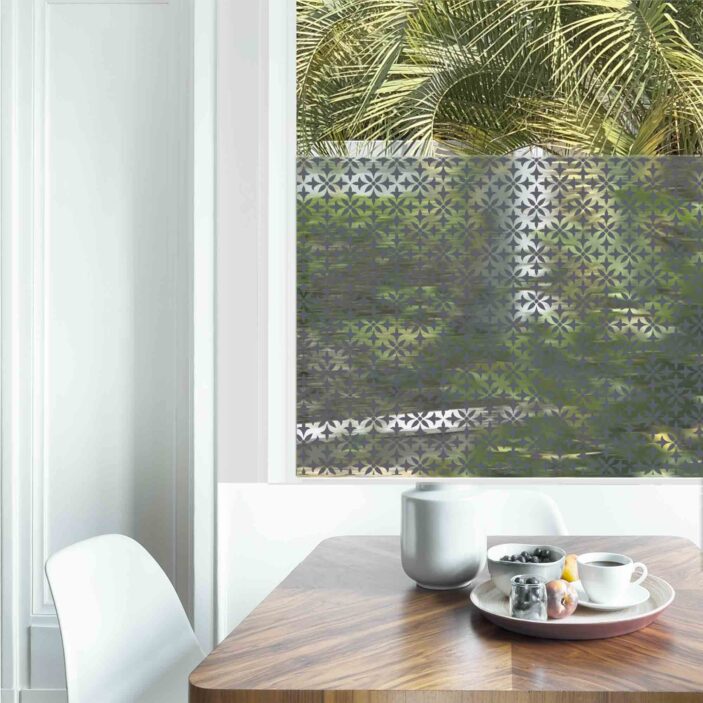 Dining table with fresh flowers and breakfast tray with coffee c Dining table with fresh flowers and breakfast tray with coffee c