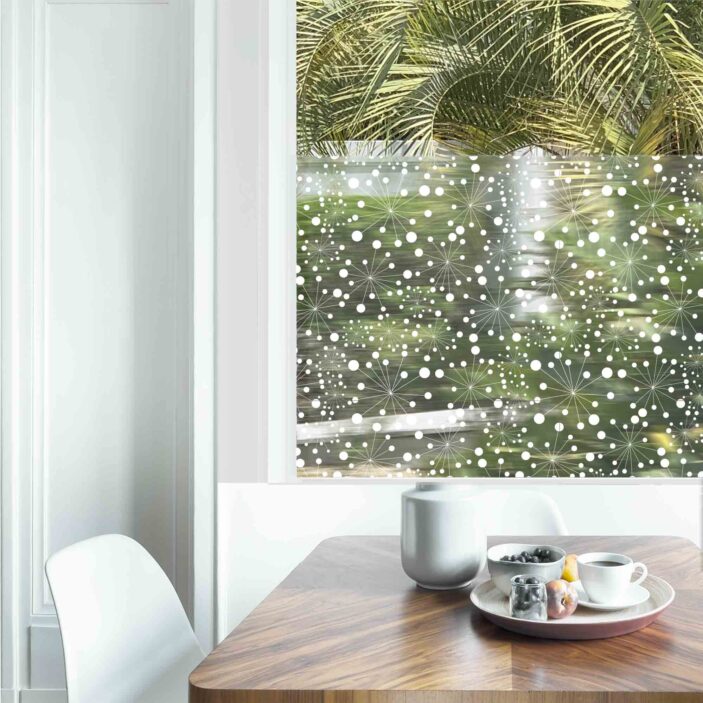 Dining table with fresh flowers and breakfast tray with coffee c Dining table with fresh flowers and breakfast tray with coffee c