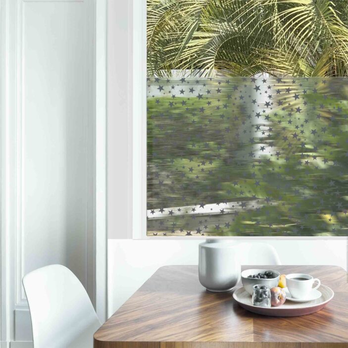 Dining table with fresh flowers and breakfast tray with coffee c Dining table with fresh flowers and breakfast tray with coffee c