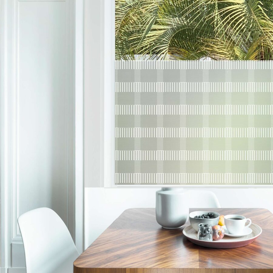 A breakfast table sets the scene for privacy film for windows, with a vertical and horizontal lined pattern.