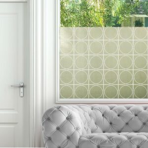 Circular iron fretwork privacy window film pattern in white.